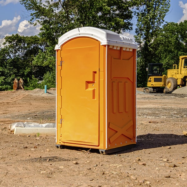 how often are the portable restrooms cleaned and serviced during a rental period in Alcona County